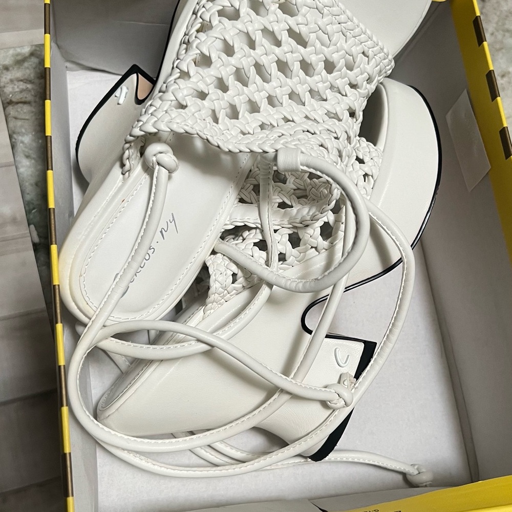 Circus by circus platform, white shoes